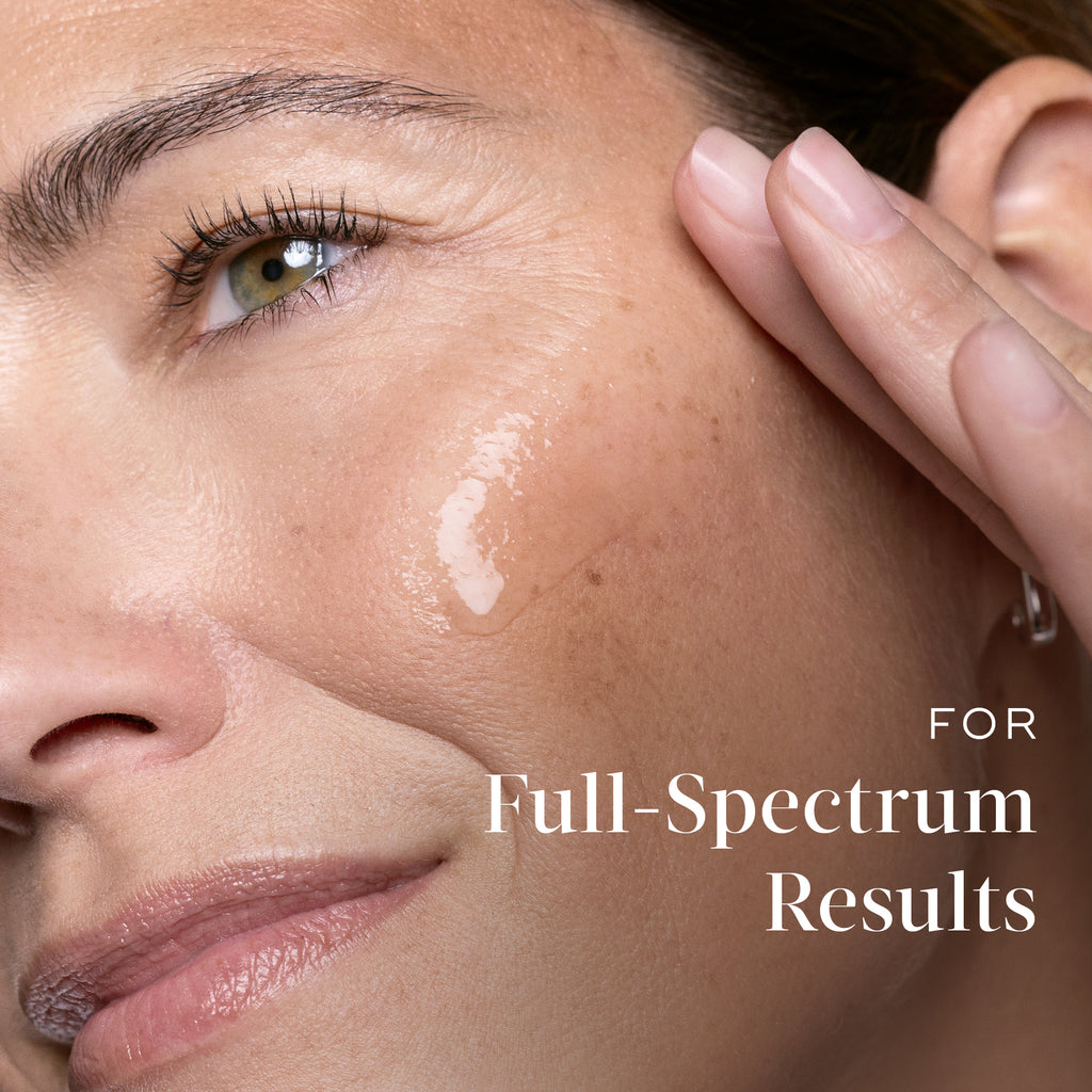 Close-up of a woman applying Medik8 serum to her cheek with text referencing full-spectrum results.